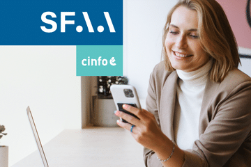 A business women checking her mobile; in the right part of the picture you can see the logo of SFAA and cinfo